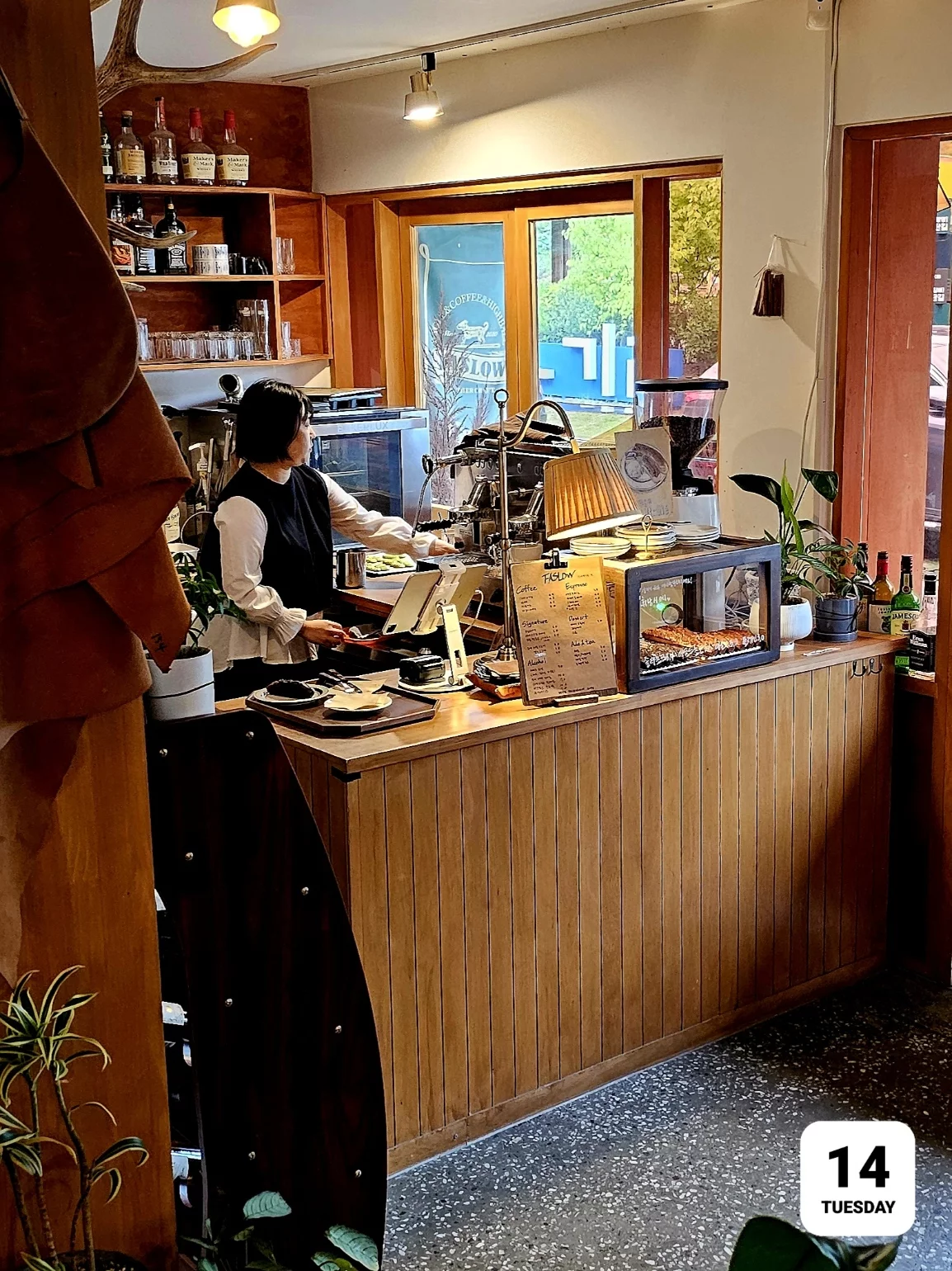 Wet scooter wheels and path showing the challenging rainy conditions of day one